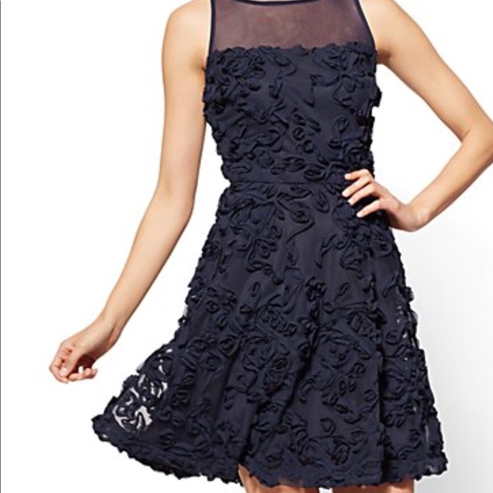 Stunning navy dress with flower pattern detail NWT